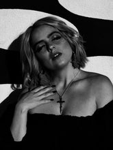 Load image into Gallery viewer, model with kings of alchemy xiphos pendant silver chain vblack and white against black and white wall