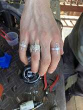 Load image into Gallery viewer, 925 sterling silver hypnos god of sleep ring on a finger with ankh rings on other fingers
