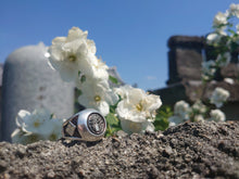 画像をギャラリービューアに読み込む, sterling silver japanese kamon ring with triforce design on a temple wall. plum blossoms and  japanese temple in background.
