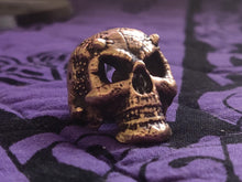Load image into Gallery viewer, devil skull ring bronze on purple fabric
