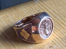 Load image into Gallery viewer, kings of alchemy bronze kamon ring with family crest on table
