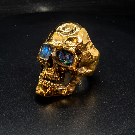 Gold skull ring sales with diamond eyes