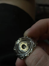 Load image into Gallery viewer, sterling silver ring of the eye of polyphemus the greek cyclops on finger. lower view
